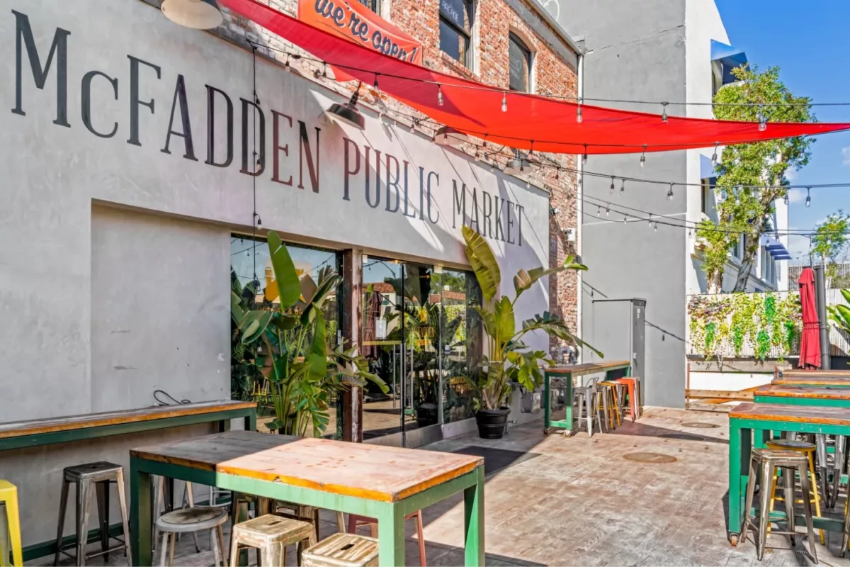 Exterior of the McFadden Public Market with outdoor seating